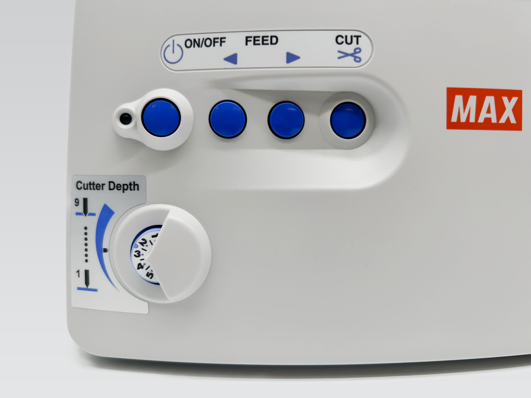 Side view of CPM-100 printer with a "On/Off button", "Feed button" and a "cut" button. A cutter Depth dial from 1 to 9.